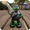 Sculptural glass pipe in the shape of a Ninja Turtle character