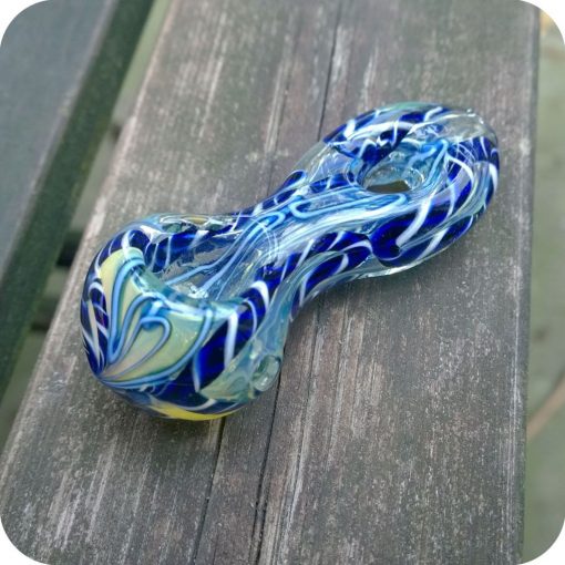 Short silver fumed glass pipe with blue and white inside-out designs and a donut-hole shaped mouthpiece
