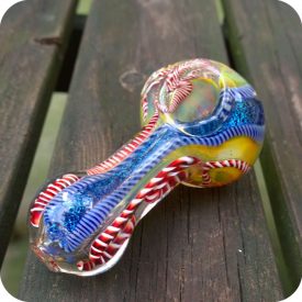 Colorful double blown silver fumed glass smoking pipe with latticino inside out designs and a strip of dichroic glass